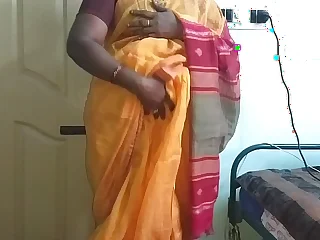 desi  indian horny tamil telugu kannada malayalam hindi cheating wife vanitha wearing orange colour saree  showing big boobs and shaved pussy press fast boobs press nip rubbing pussy masturbation